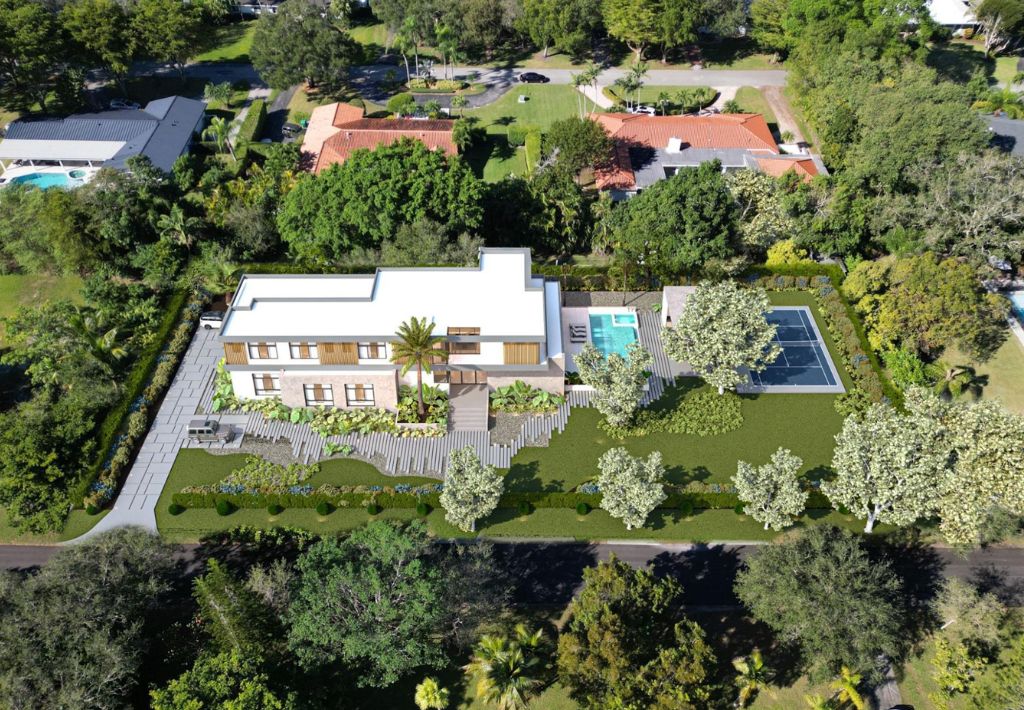 Aerial view of a modern two-story house with a pool, tennis court, and landscaped garden, offering resort style living and surrounded by trees and neighboring houses in a suburban area.