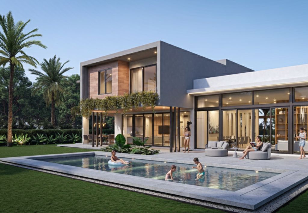 Modern two-story house with large windows, a patio, and a swimming pool offers resort style living. Several people relax by the pool and inside the house, surrounded by green trees and a well-kept lawn under a clear sky.