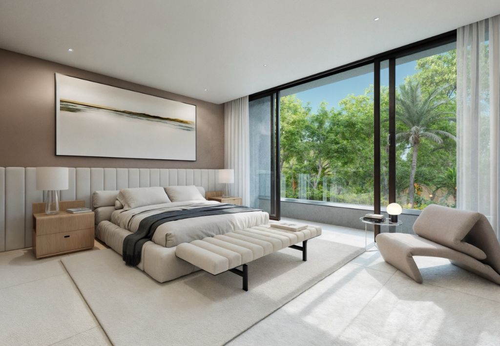 Modern bedroom with a large bed, neutral tones, and abstract artwork above the headboard offers resort style living, featuring a glass wall overlooking lush green trees, minimalist furniture, and ample natural light.